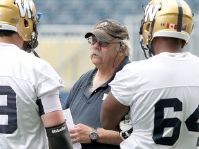 Offensive line coach Bob Wylie speaks with Winnipeg Blue Bombers offensive linemen during a practice. Wylie will join the Ottawa Redblacks' staff for 2020 season.
