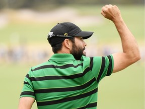 Adam Hadwin of Canada and the International team reacts on the 15th green during Sunday Singles matches on day four of the 2019 Presidents Cup at Royal Melbourne Golf Course on December 15, 2019 in Melbourne, Australia.