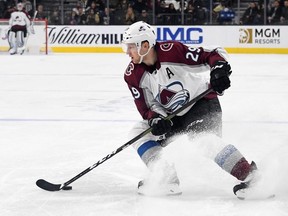 Nathan MacKinnon of the Colorado Avalanche skates with the puck against the Vegas Golden Knights in the first period of their game at T-Mobile Arena on December 23, 2019 in Las Vegas, Nevada.