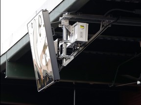 In this July 10, 2019, file photo, a radar device is seen on the roof behind home plate at PeoplesBank Park during the third inning of the Atlantic League All-Star minor league baseball game in York, Pa. (AP Photo/Julio Cortez, File)