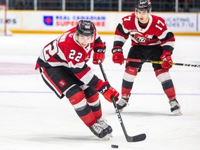 Mitchell Hoelscher (right) and Jack Quinn of the Ottawa 67's.
