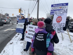 Parents of children with autism rallied outside MPP Jeremy Roberts's Merivale Road constituency office Sunday to lobby the provincial government to deliver needs-based services now.