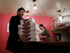 Prime Minister Justin Trudeau was criticized online for posting a picture of himself purchasing doughnuts from a Winnipeg-based shop. (Twitter)