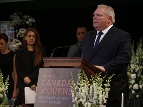 Ontario Premier Doug Ford addresses mourners in the packed University of Toronto's Convocation Hall for an event called Canada Mourns - In Memory of Iran Crash Victims on Sunday, Jan. 12, 2020. (Jack Boland/Toronto Sun/Postmedia Network)