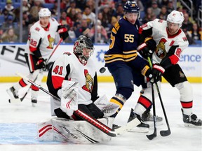 Senators goaltender Craig Anderson makes a save on a shot by the Sabres during the second period of the game on Tuesday night.