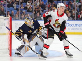 Senators left-winger Brady Tkachuk provides a screen in front of Sabres goaltender Linus Ullmark early in the third period of Tuesday's game in Buffalo.