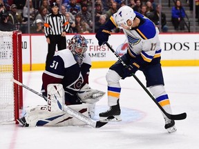 Colorado Avalanche goaltender Philipp Grubauer (31) makes a save against St. Louis Blues left wing Jaden Schwartz (17) in the third period at the Pepsi Center. Mandatory Credit: Ron Chenoy-USA TODAY Sports ORG XMIT: USATSI-405737