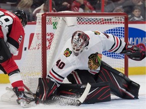 Chicago Blackhawks goalie Robin Lehner (40) makes a save in front of Ottawa Senators right wing Connor Brown (28) in the second period at the Canadian Tire Centre.