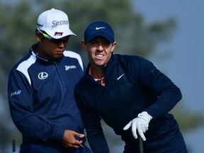 Rory McIlroy reacts to his tee shot on the second hole during the third round of the Farmers Insurance Open at Torrey Pines on Saturday. (Donald Miralle/Getty Images)