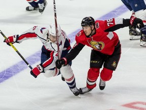 FILES: Ottawa Senators Filip Chlapik battles with Washington Capitals Garnet Hathaway during NHL action at the Canadian Tire Centre in Ottawa on Friday January 31, 2020.