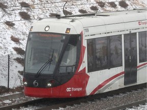 LRT travelling in the ice and snow in Ottawa on Monday, Dec 30, 2019.