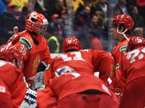 Russia's Yaroslav Askarov, left, and Grigori Denisenko, right, get ready to take on Sweden at Ostravar Arena, Jan. 4, 2020. (Andrea Cardin/HHOF-IIHF Images)