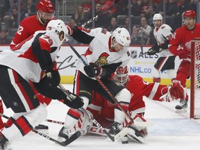 Red Wings goaltender Jonathan Bernier stops a shot by Senators’ Tyler Ennis on Friday night in Detroit. (THE ASSOCIATED PRESS)