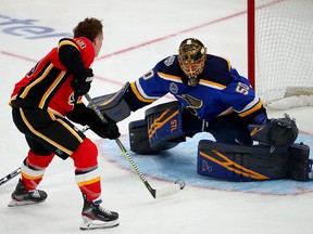 Matthew Tkachuk of the Calgary Flames competes against Jordan Binnington of the St. Louis Blues in the Bud Light NHL Save Streak during the 2020 NHL All-Star Skills Competition at Enterprise Center on Jan. 24, 2020 in St. Louis, Mo.