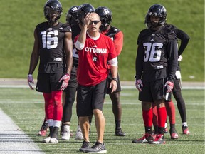 Noel Thorpe instructs his defensive backs while with the Ottawa Redblacks in October 2018.