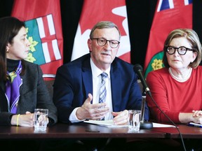 President and chief executive officer of Public Health Ontario, Dr. Eileen de Villa, left, Dr. David Williams, chief medical officer of Health, and Dr. Barbara Yaffe during a press conference to announce the first 'presumptive' case of the coronavirus in Canada on Saturday January 25, 2020.