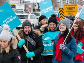 Teachers from the Ontario English Catholic Teachers Association picket along Merivale Road in Ottawa as part of a one-day, province-wide strike. February 4, 2020.