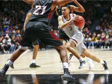 Calvin Epistola of Ottawa drives to the net in the men's Capital Hoops Classic basketball game between the University of Ottawa and Carleton University