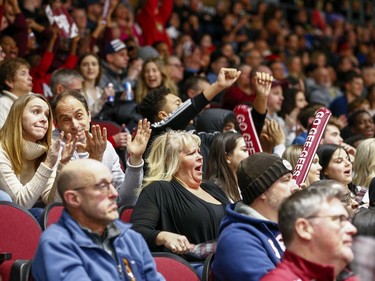 University of Ottawa fans cheer in the women's Capital Hoops Classic basketball game between the University of Ottawa and Carleton University.