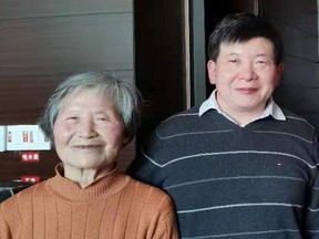 Kai Huang, right, and his mother Yi.