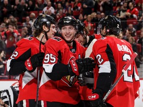Matt Duchene #95 of the Ottawa Senators celebrates his second period goal against the Winnipeg Jets with team mates Thomas Chabot #72, Dylan DeMelo #2 and Bobby Ryan #9 at Canadian Tire Centre on February 9, 2019 in Ottawa, Ontario, Canada.