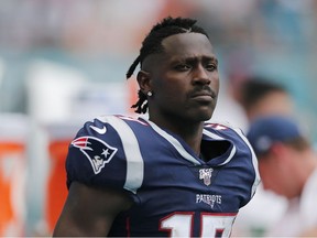 Antonio Brown of the New England Patriots looks on against the Miami Dolphins during the fourth quarter at Hard Rock Stadium on September 15, 2019 in Miami, Florida.