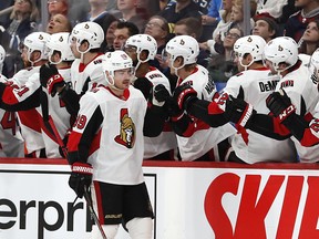 Ottawa Senators winger Mikkel Boedker celebrates with teammates after scoring a goal in the second period against the Winnipeg Jets on Saturday. (USA TODAY SPORTS)