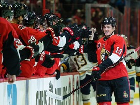 Drake Batherson of the Ottawa Senators celebrates his first-period goal against the Buffalo Sabres with teammates on the bench at Canadian Tire Centre on Tuesday.