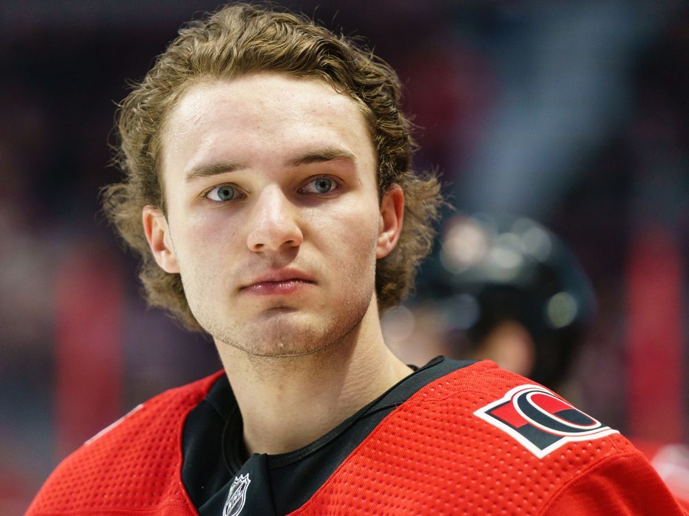 Josh Norris of the Ottawa Senators looks on during the warmups prior to a game against the Montreal Canadiens at Canadian Tire Centre on Saturday.