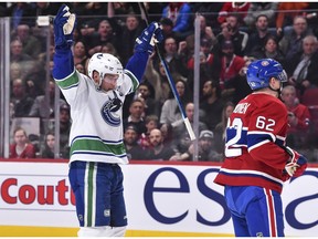 Bo Horvat of the Canucks celebrates after scoring a first-period goal against the Canadiens in Montreal on Tuesday night.