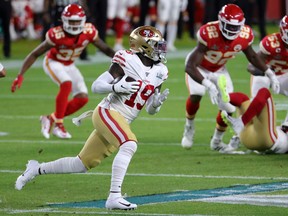 Deebo Samuel of the San Francisco 49ers takes the ball 32 yards on a first-quarter reverse for the first big play of the game.. (Photo by Sam Greenwood/Getty Images)