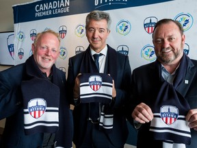 From left, Atlético Ottawa strategic partner Jeff Hunt, Club Atlético de Madrid general manager Miguel Ángel Gil and Canadian Premier League commissioner David Clanachan were on hand for the debut news conference of Ottawa's new soccer club. (ERROL MCGIHON/Ottawa Sun)
