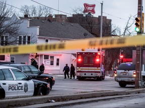 Police investigate a shooting at the Molson Coors headquarters in Milwaukee, Wis., Feb. 26, 2020. (REUTERS/Sara Stathas)
