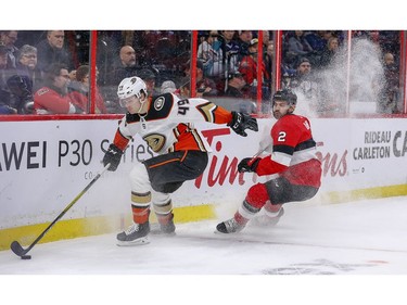 Dylan DeMelo (right) chases Max Jones in the second period as the Ottawa Senators take on the Anaheim Ducks in NHL action at the Canadian Tire Centre in Ottawa.