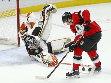 Ducks goalie John Gibson knocks the puck off Drake Batherson's stick in the overtime shootout period as the Ottawa Senators take on the Anaheim Ducks in NHL action at the Canadian Tire Centre in Ottawa.