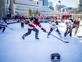 The Ottawa Senators Alumni and NHL Alumni held a shinny game at the Rink of Dreams in front of City Hall Saturday, February 8, 2020, part of the Home Town Hockey Tour. The teams battled it out as the puck flew over the boards and the photographer.