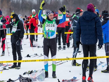 Michel Labrie stretches before taking part in the 27 km Classic event at the Gatineau Loppet. February 15, 2020. Errol McGihon/Postmedia