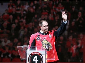Phillips gets a standing ovation during his jersey retirement ceremony.