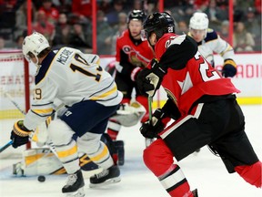 Nick Paul picks up speed as the puck hovers dangerously close to Buffalo's net during the Ottawa Senators' matchup against the Buffalo Sabres Tuesday night at the Canadian Tire Centre.