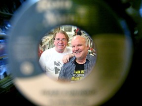 James Boyd, left, and Ian Boyd are the longtime owners of Compact Music on Bank Street in downtown Ottawa.