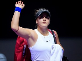 Bianca Andreescu waves after retiring injured from her match against Czech Republic's Karolina Pliskova at the WTA Tour Finals, in Shenzhen, Guangdong province, China, on Oct. 30, 2019.