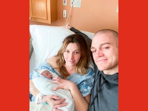 Mark Borowiecki, his wife Tara and their new son, Miles.
