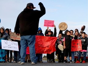 Supporters of the Indigenous Wet'suwet'en Nation's hereditary chiefs block the Pat Bay highway as part of protests against the Coastal GasLink pipeline in Victoria on Feb. 26, 2020.
