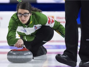 Saskatchewan lead Kara Thevenot makes a shot against New Brunswick in the opening draw of the 2020 Scotties curling championship on Saturday at Moose Jaw, Sask.