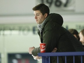 Maple Leafs GM Kyle Dubas watches practice on Wednesday. Jack Boland/Toronto Sun