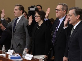 Constitutional scholars (L-R) Noah Feldman of Harvard University, Pamela Karlan of Stanford University, Michael Gerhardt of the University of North Carolina, and Jonathan Turley of George Washington University are sworn in prior to testifying before the House Judiciary Committee in the Longworth House Office Building on Capitol Hill December 4, 2019 in Washington, D.C. (Alex Wong/Getty Images)