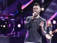 Maroon 5 singer Adam Levine performs during the 61th Vina del Mar International Song Festival in Vina del Mar, Chile, on Feb. 27, 2020. (JAVIER TORRES/AFP via Getty Images)