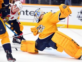 Predators goaltender Juuse Saros makes a save on an attempt by Senators left-winger Brady Tkachuk during the second period of Tuesday's game.
