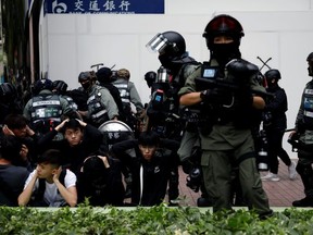 Police detain anti-government protesters after an anti-parallel trading protest at Sheung Shui, a border town in Hong Kong, China January 5, 2020.