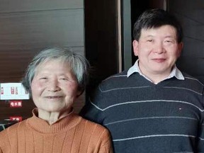 Kai Huang, right, and his mother Yi.